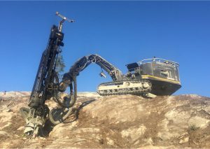 Stone spider crawler drilling on the rock